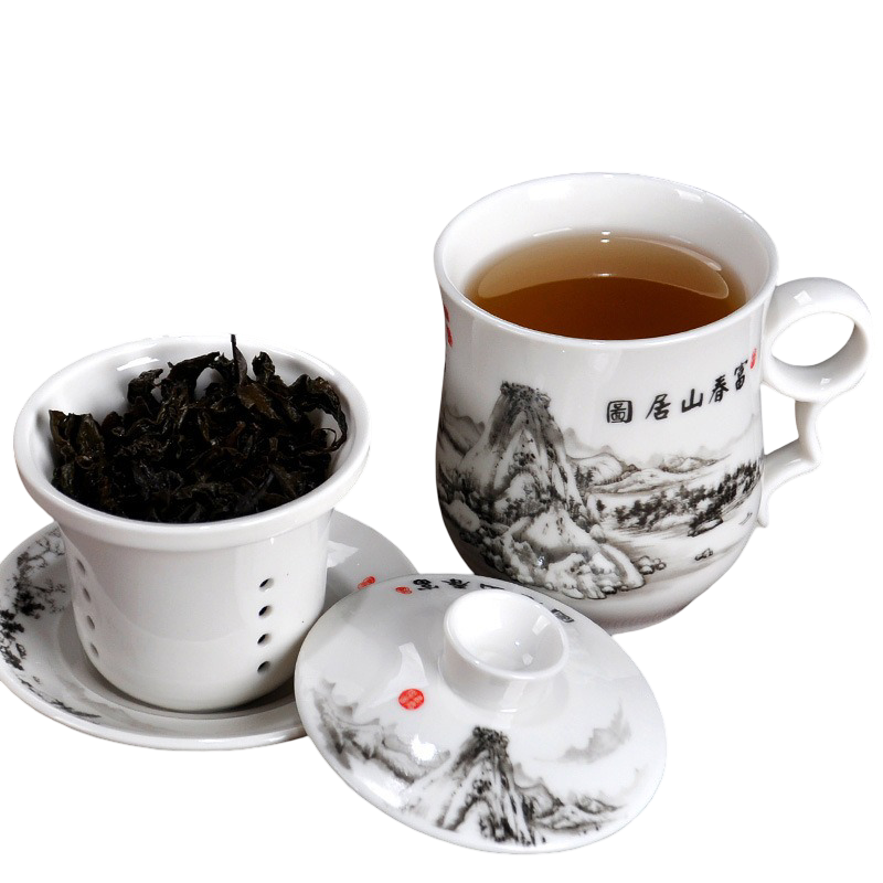 Tea set with a cup, teapot, and saucer featuring mountain landscape design on a white background.