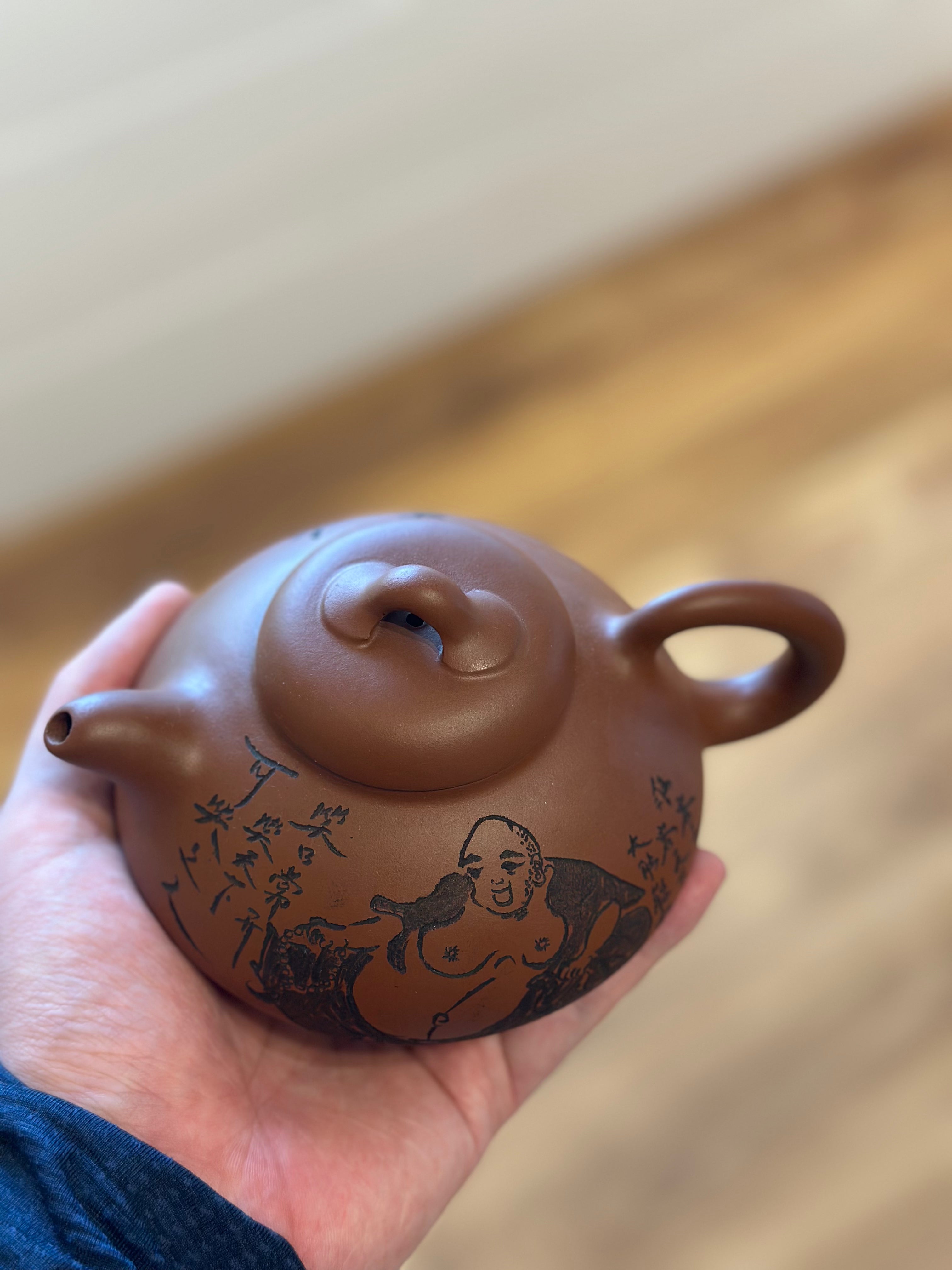 Fine Yixing Zhuni teapot with Laughing Buddha engraving| TigerlilyTea