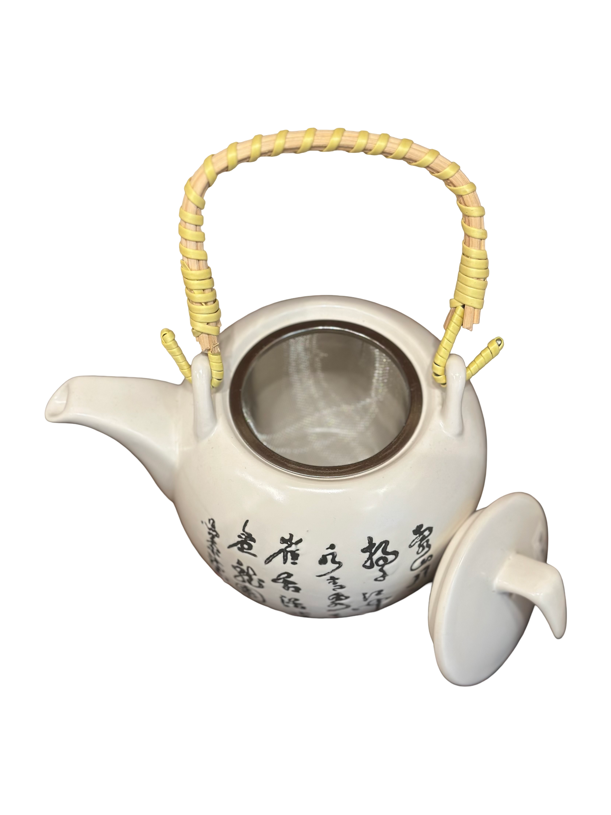 White ceramic teapot with a yellow handle on a white background