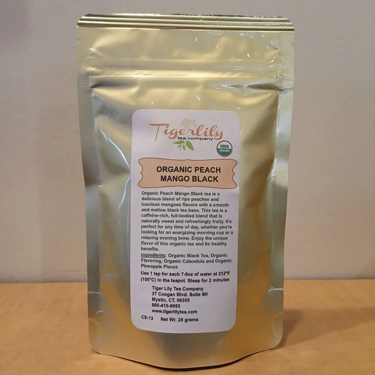 Organic Peach Mango Black tea pouch by Tiger Lily Tea